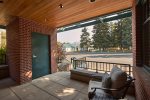 East side patio with two chairs overlooking Forest Service Park